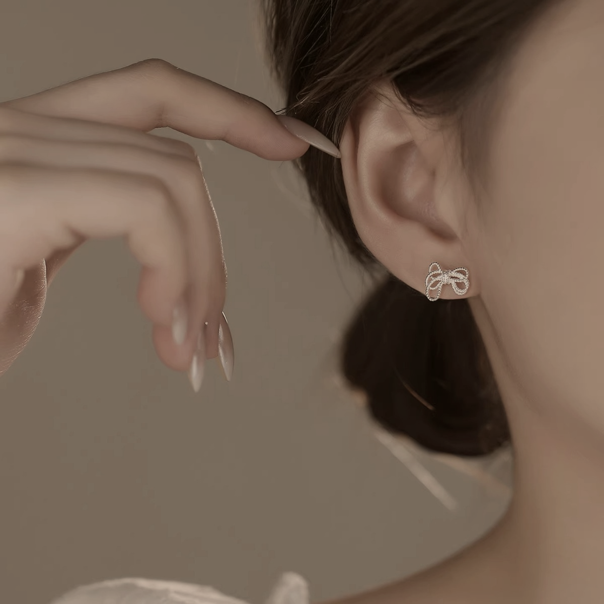 The Beaded Bow Stud Earrings
