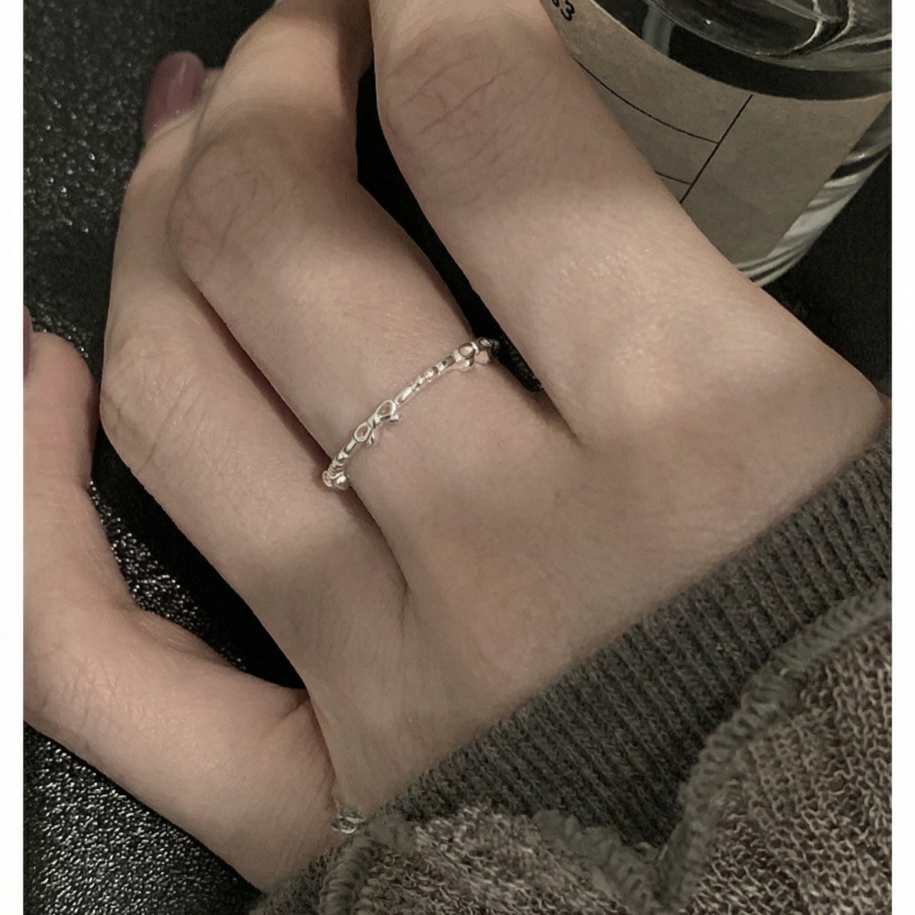 The Bow and Bead Ring