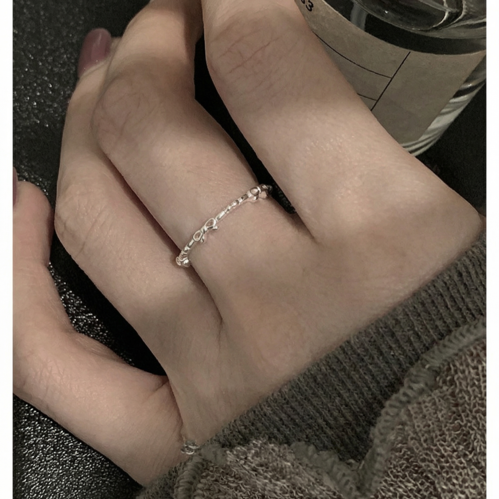 The Bow and Bead Ring